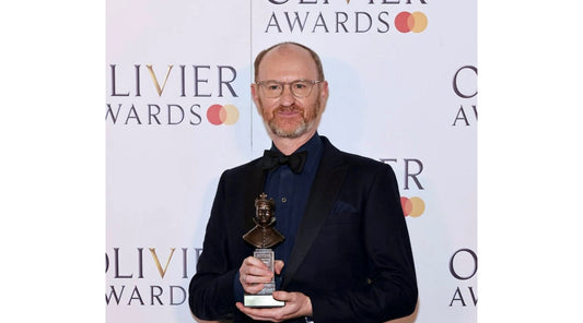Mark Gatiss receives Olivier award wearing Budd
