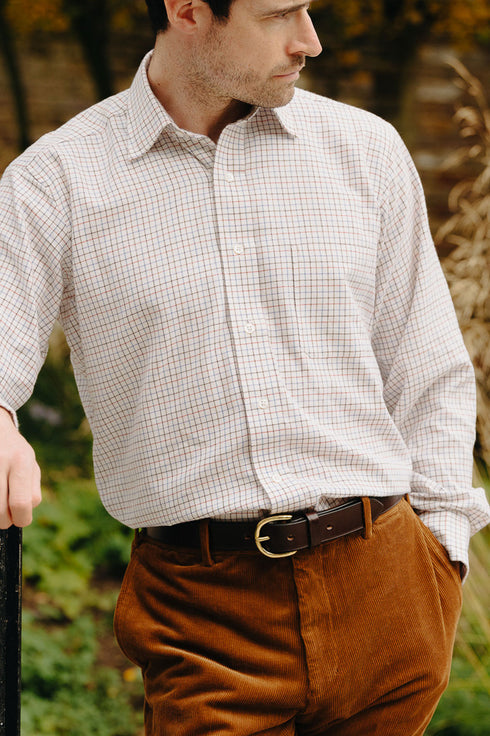 Male model stood outside in garden wearing new brushed cotton checked shirt