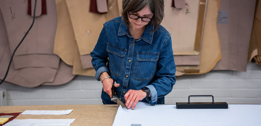 Andover workroom cutting fabric for a made to measure shirt